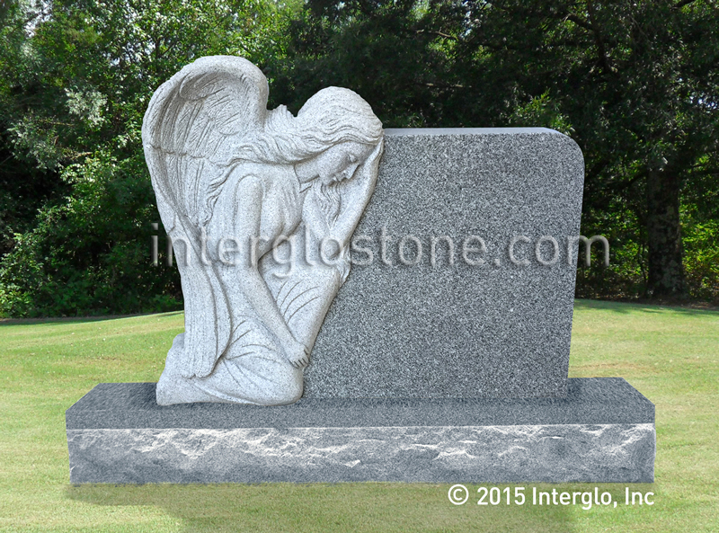 Grieving Angel on Rock Headstone