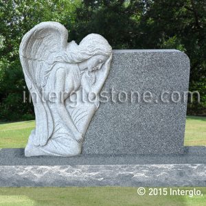 grieving-angel-on-rock-headstone